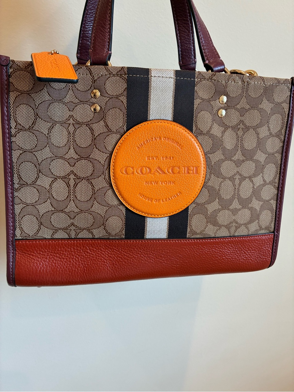 Coach Dempsey Carryall Bag in Signature Jacquard with Stripe and orange Patch